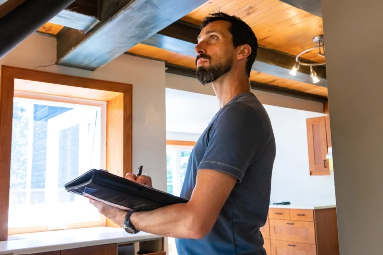 home interior and exterior contractor inspects thermal tracking due to bridging