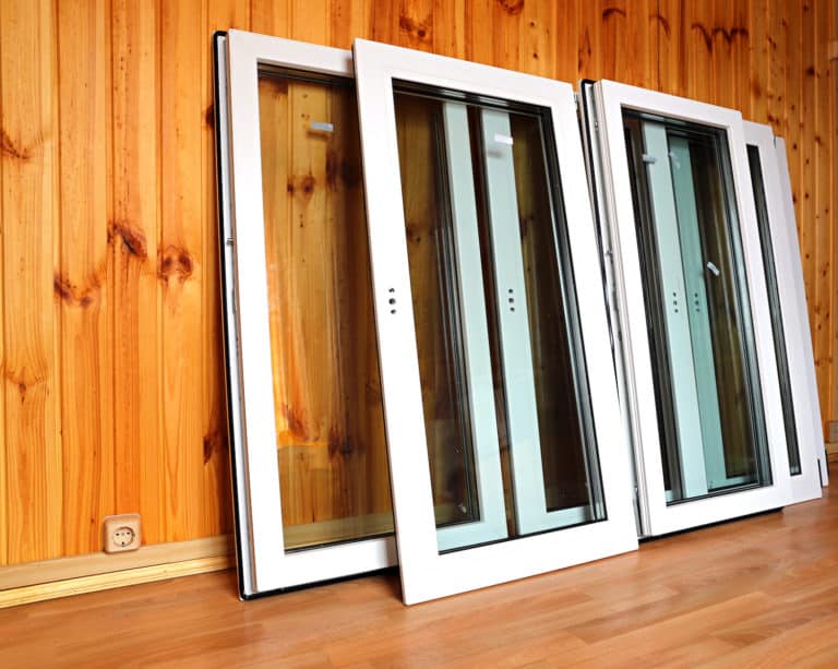 best window brands new windows leaning on wall before installation