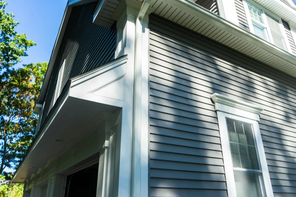 close up of grey vinyl siding replacement on maryland home