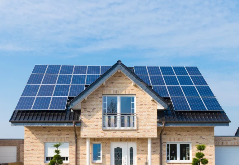 beautiful house with solar panels installed on roof