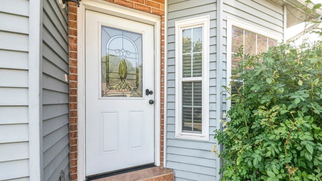 close up of new front door installation with vinyl door materials