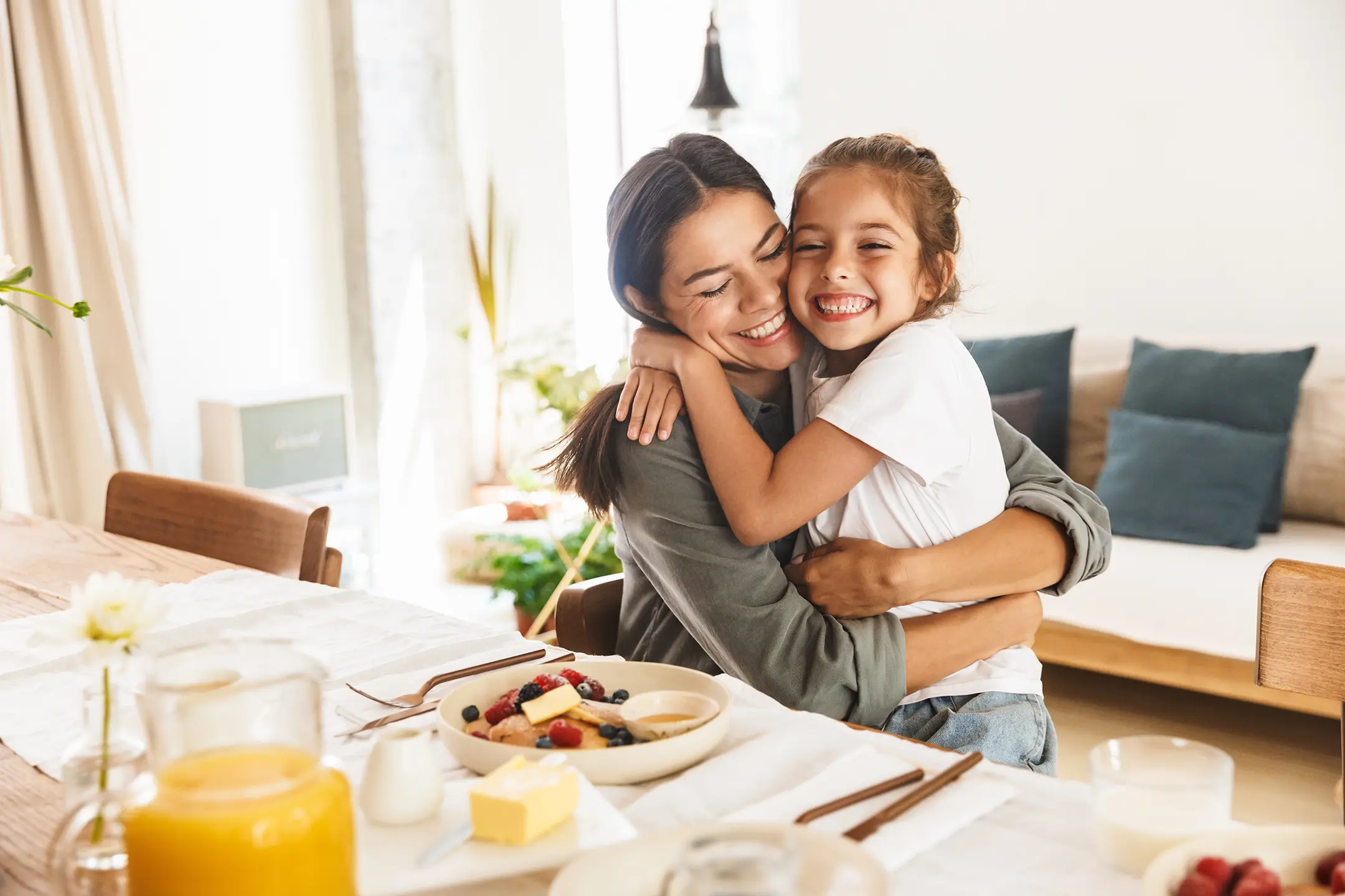 mother and daughter hugging