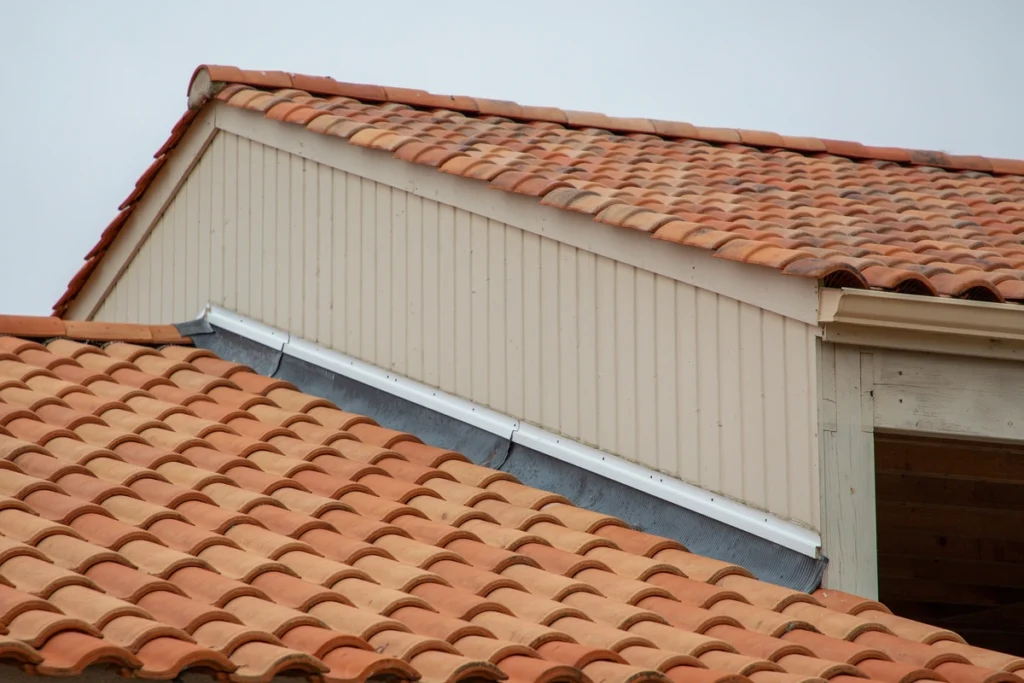 roof flashing repair-step flashing between a wall and a roof