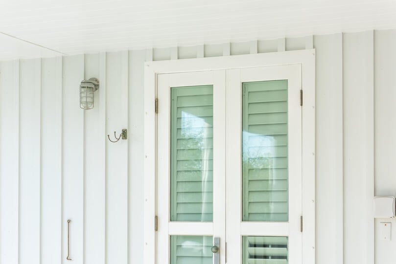 what are storm windows-exterior of a home with storm windows on a door
