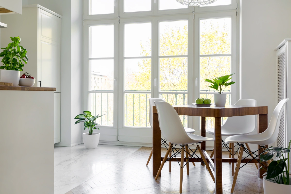 room with dining table and windows