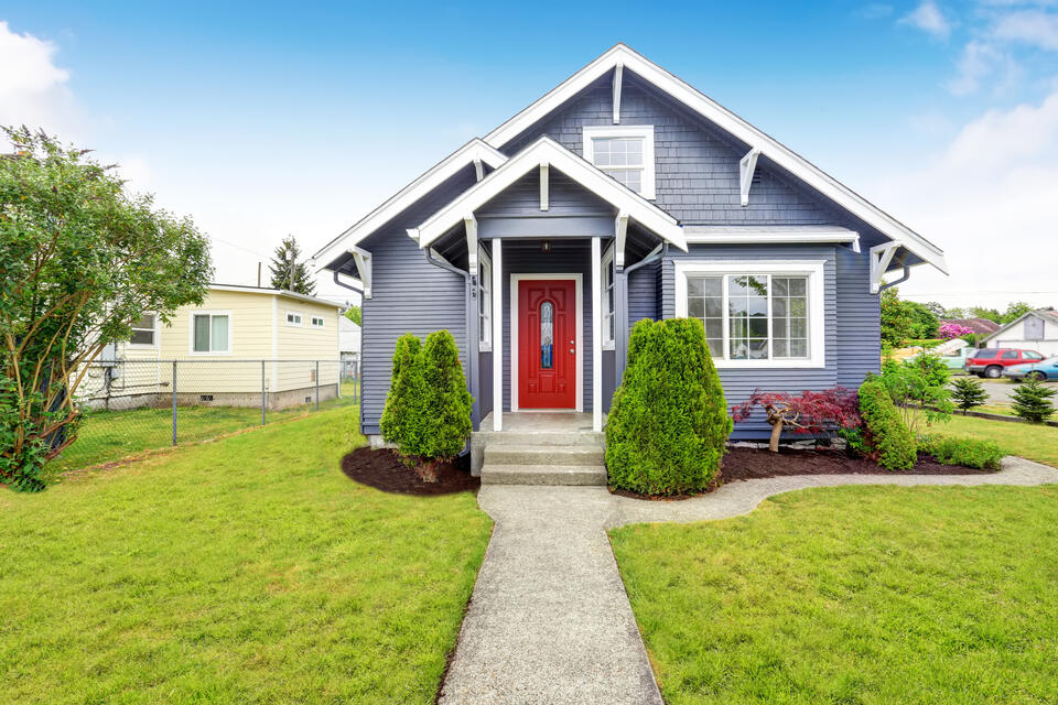 energy efficient doors-red fiberglass door on blue sided house