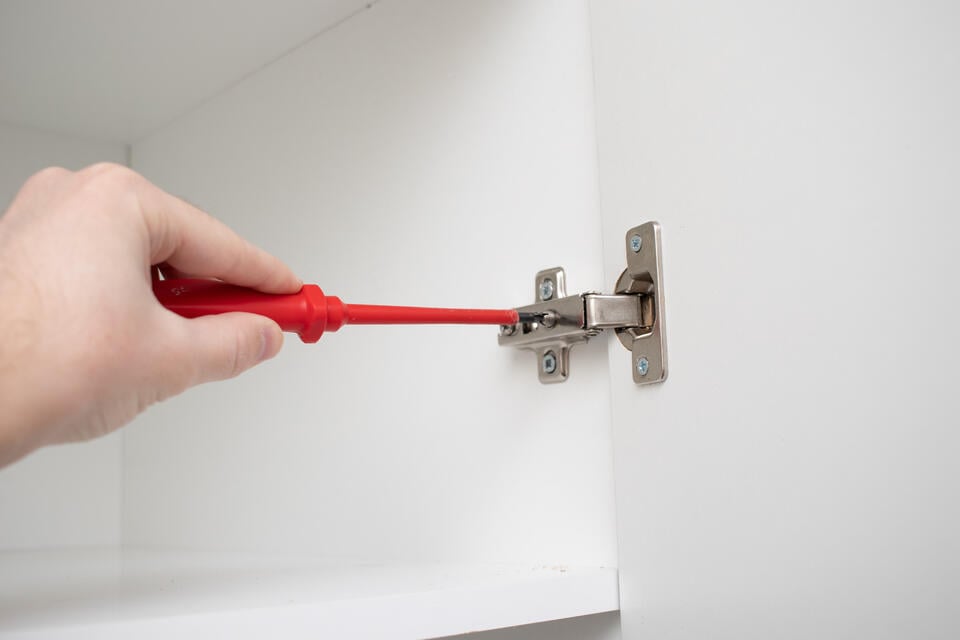 types of hinges-spring hinge on cabinet