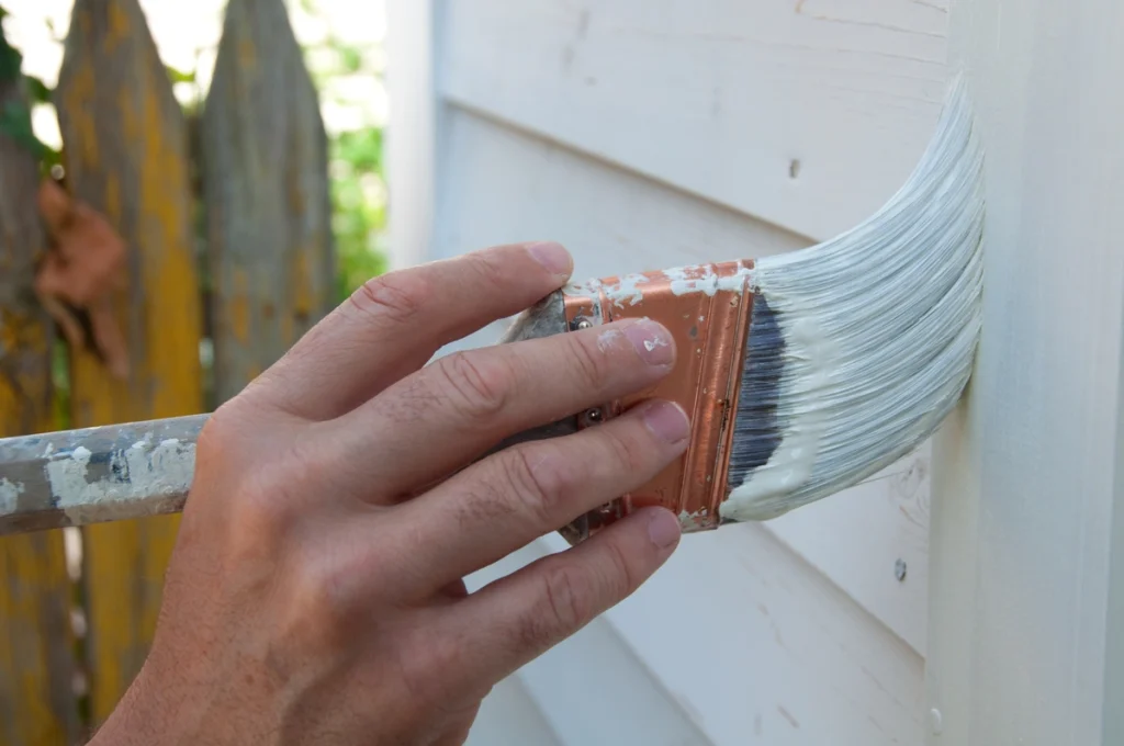 brushing siding paint