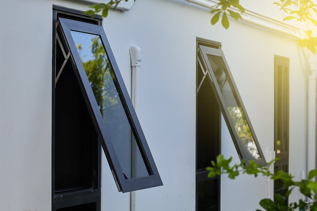 Black frame aluminum windows of building.