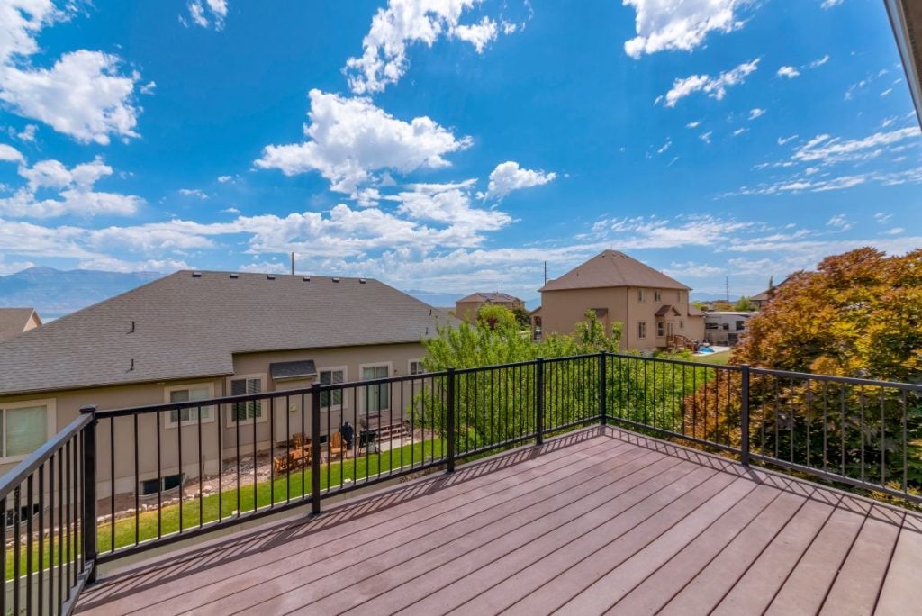 aluminum deck railing big deck brown floor blue sky
