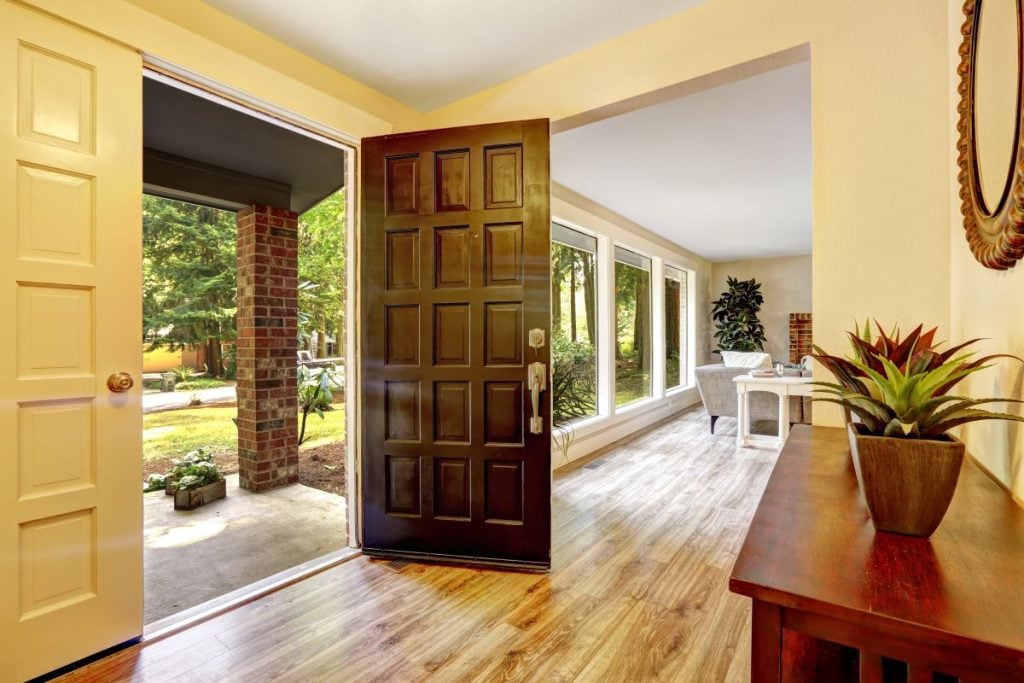 brown wooden creaky door big house