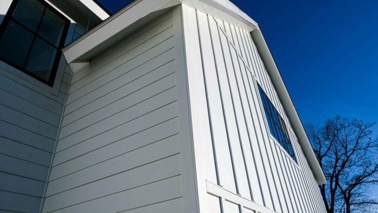 fiber cement siding white house blue sky