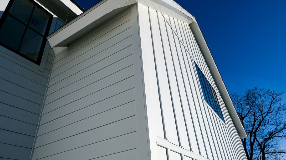 fiber cement siding white house blue sky