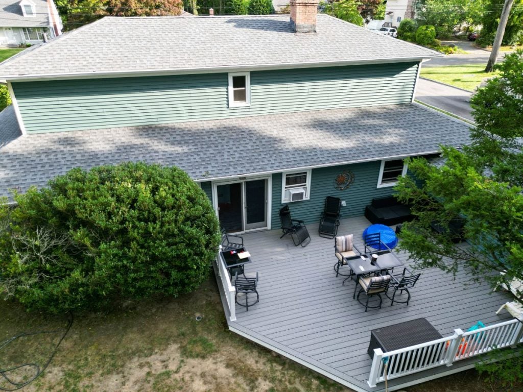 light grey sustainable roofing shingles roof small house deck