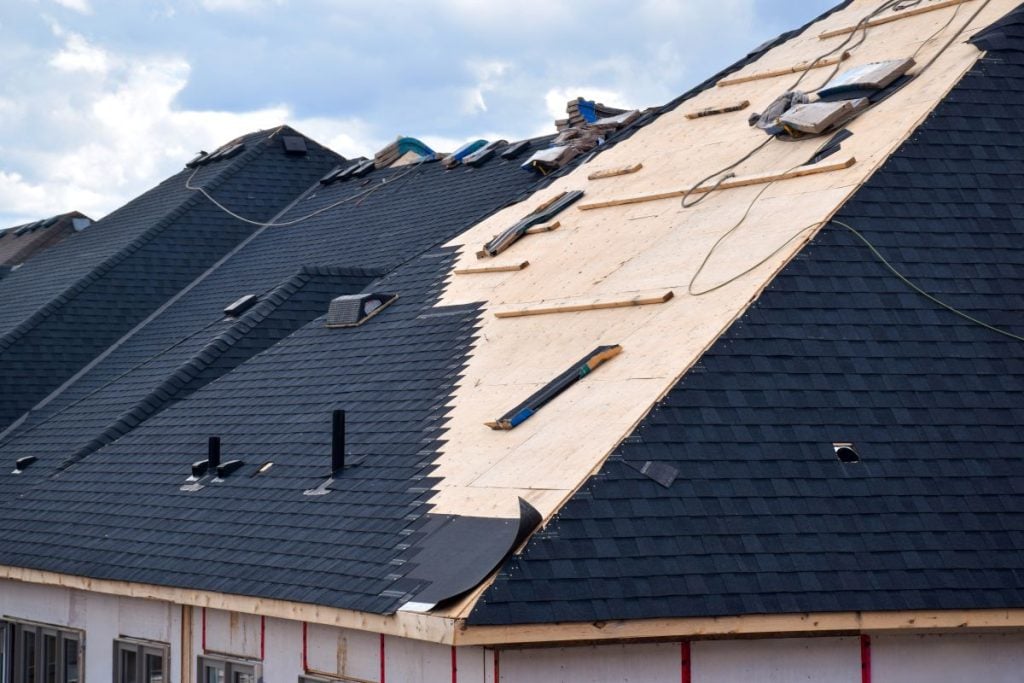 roof installation blue shingles new houseroof installation blue shingles new house