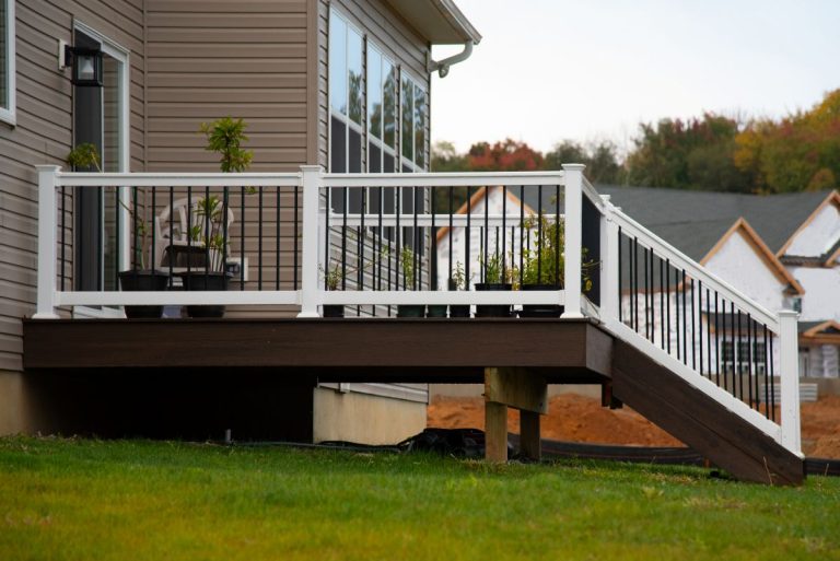white and black deck railing family home