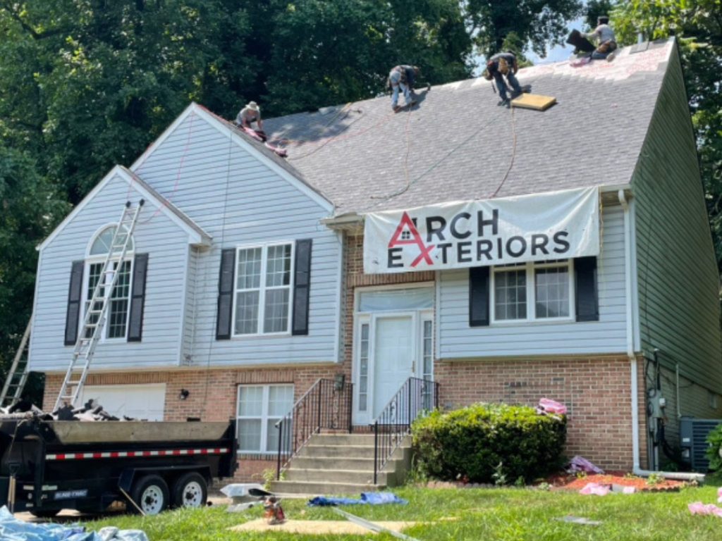 factors influencing roof lifespan workers installing new shingles roof