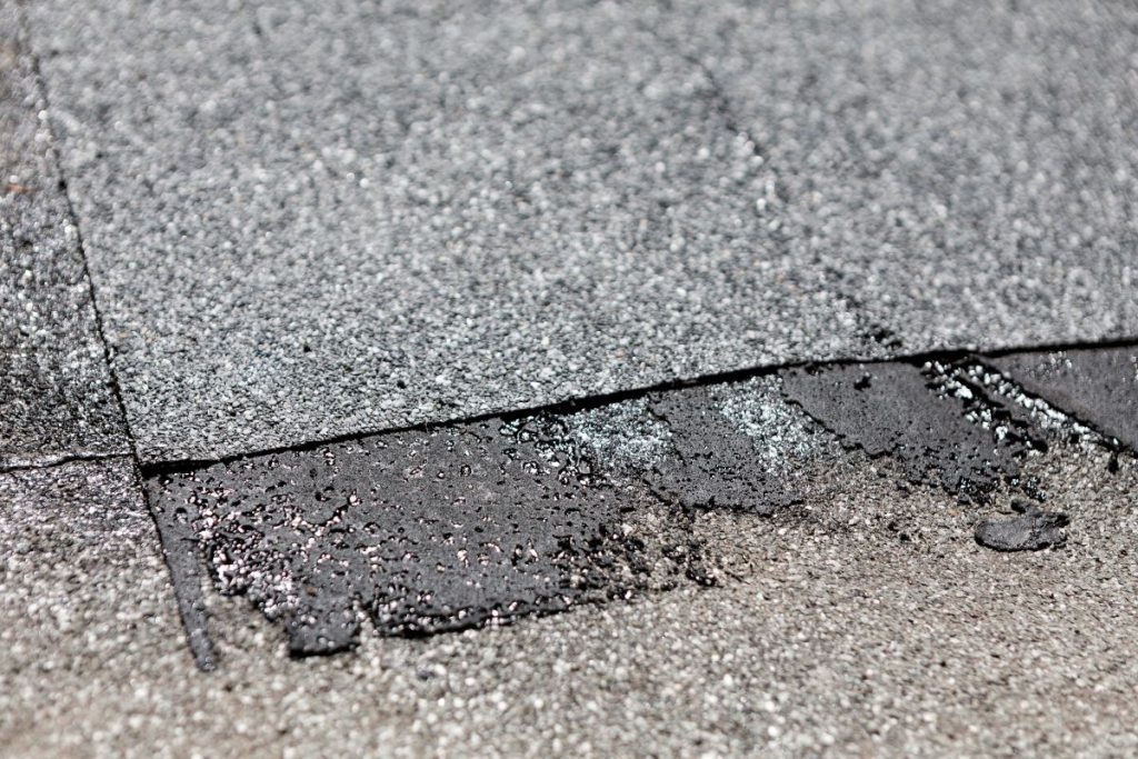 factors influencing roof lifespan old shingle granule loss signs